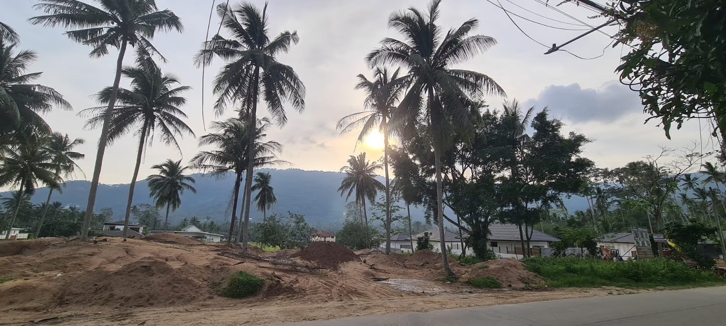 Wild Orchid Villas — construction site at sunset